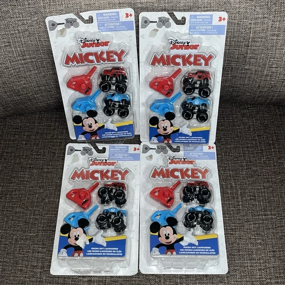 Disney‎ Junior Mickey Mouse Micro key launchers 4 Packs Of 2 Red & Blue Trucks